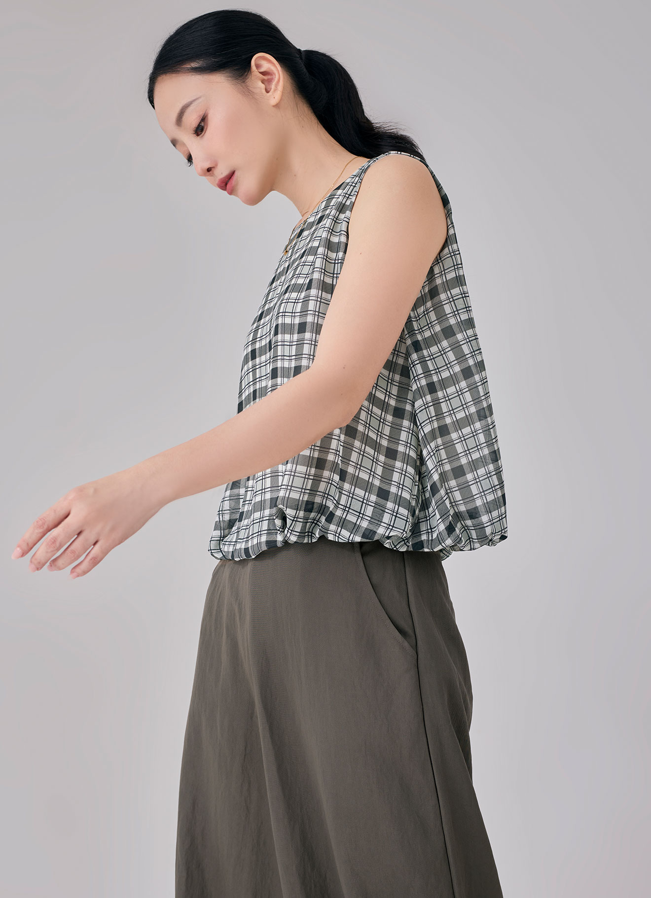 Bone-White by Sleeveless Blouse